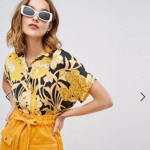 Striking tie-front patterned blouse